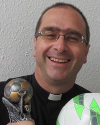 Revd Richard Burge with the World Cup fantasy football trophy!